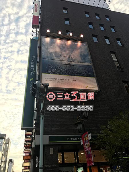 日本东京楼体外墙面三面翻广告牌案例图片