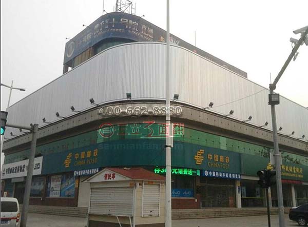 山东滨州博兴邮政局弧形转角三面翻广告牌案例图片
