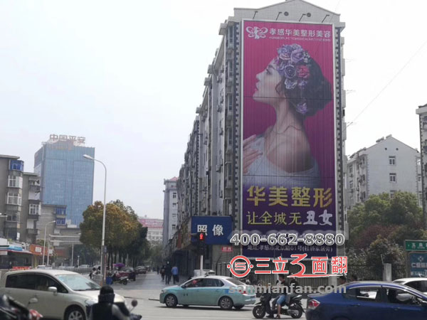 湖北省孝感市楼体拼接超高分段三面翻广告牌案例图片
