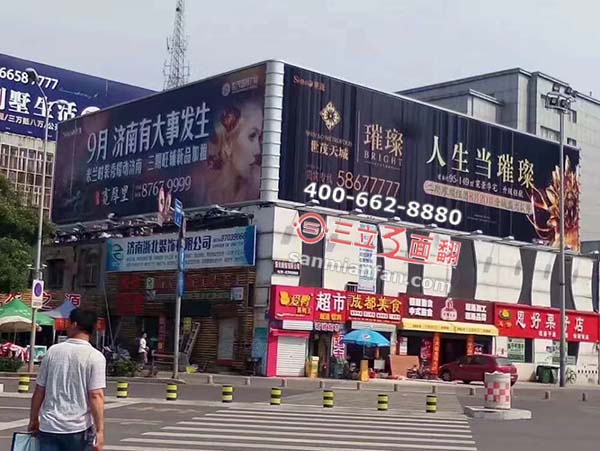 山东省济南市户外沿街路口楼顶三面翻广告牌案例图片