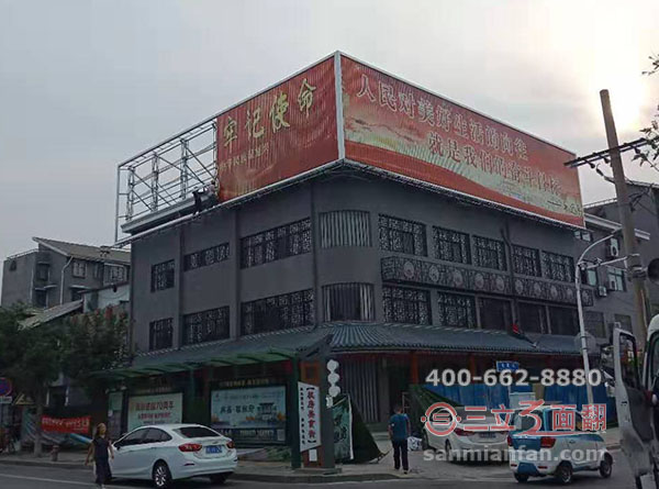 河南省许昌市楼顶钢结构三面翻广告牌案例图片