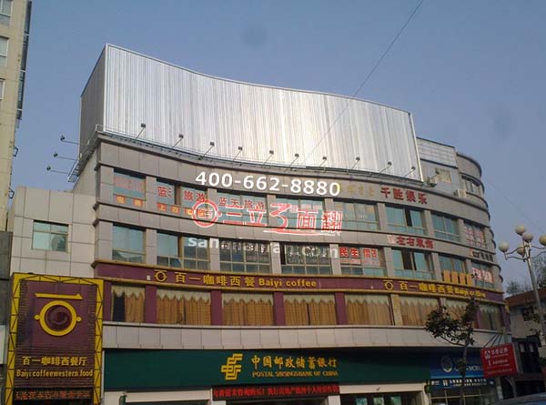 江苏连云港西餐厅楼顶S波浪异形三面翻广告牌案例图片