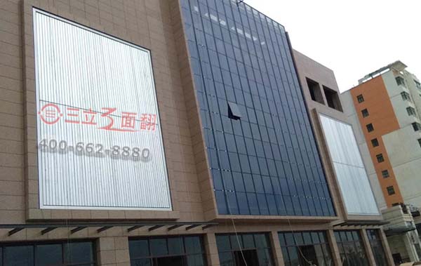 重庆市大足商场裙楼立面外墙三面翻广告牌案例图片